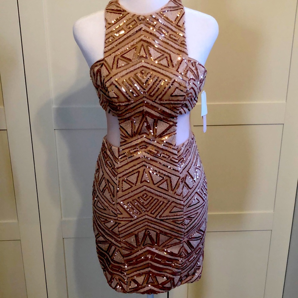 Structured Rose gold sequin  mesh side mini dress .